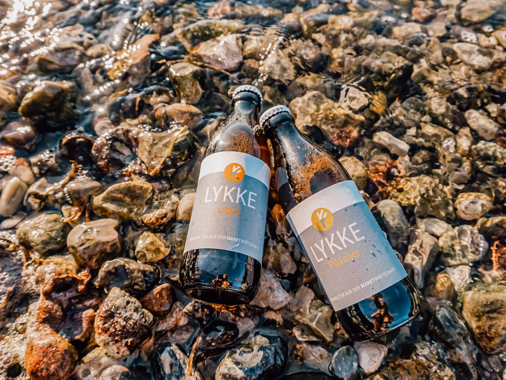 LYKKE-Bier am Strand